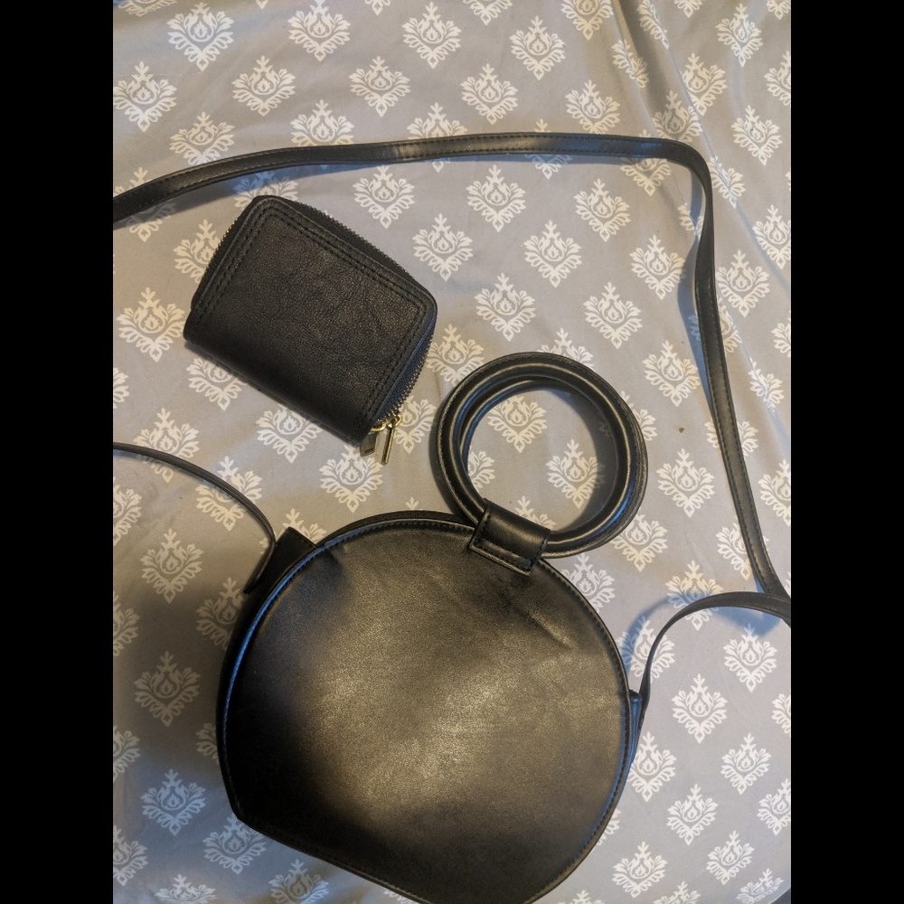 Black round crossbody bag with double sided wallet